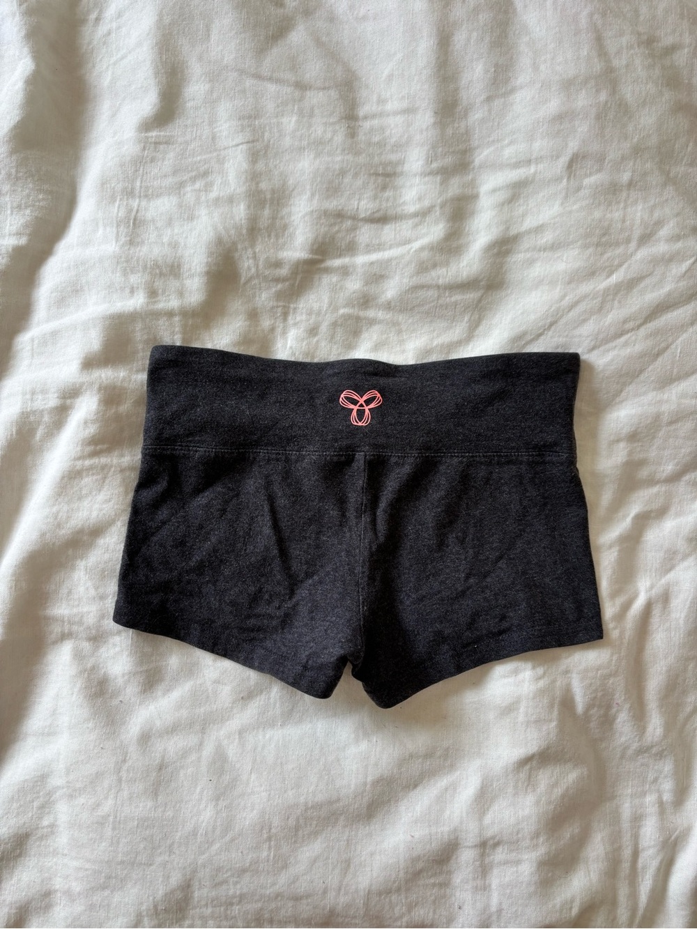Charcoal grey y2k TNA shorts with Pink Logo